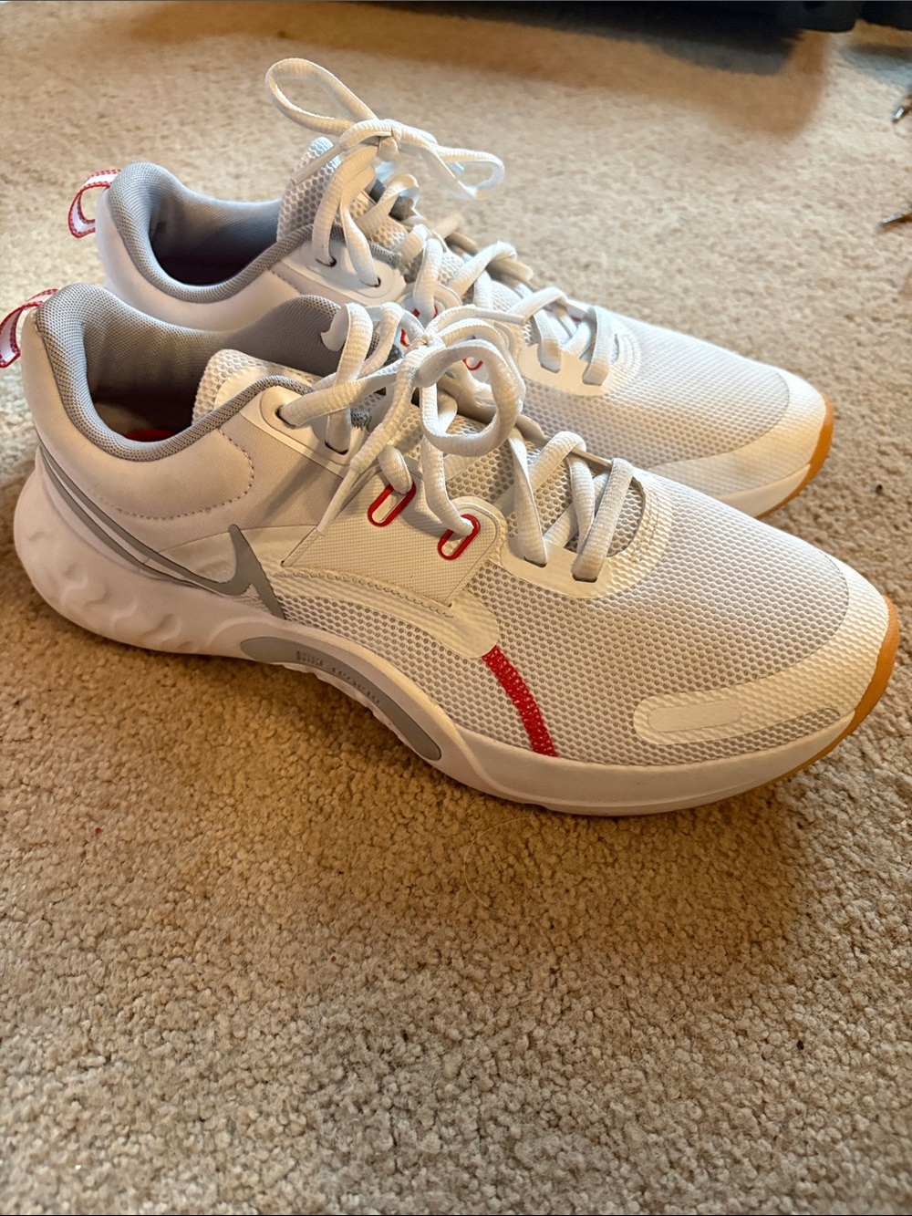 Nike White Athletic Sneakers with Red and Gray Accents
